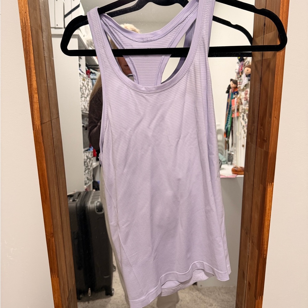 Swiftly tank hip length